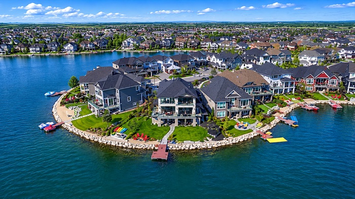 Auburn Bay lake and beach with family homes