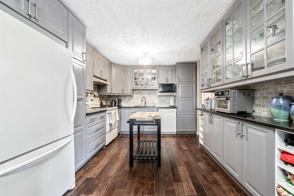 10, 310 Brookmere Road SW, Calgary — main listing photo