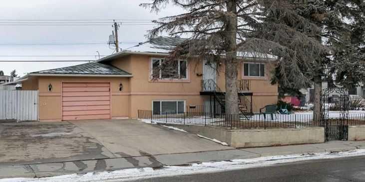 4010 8 Avenue SW, Calgary — main listing photo