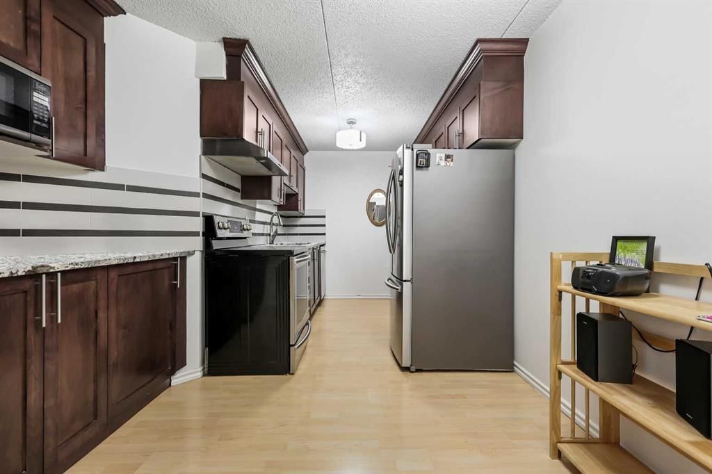 514, 5204 Dalton Drive NW, Calgary — photo 4 of 37