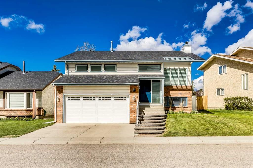 31 Woodmont Way SW, Calgary — photo 2 of 37