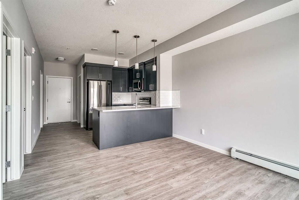 215, 300 Harvest Hills Place NE, Calgary — photo 4 of 17
