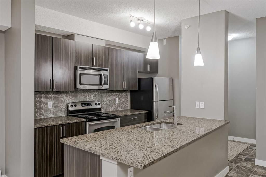 442, 23 Millrise Drive SW, Calgary — photo 2 of 41