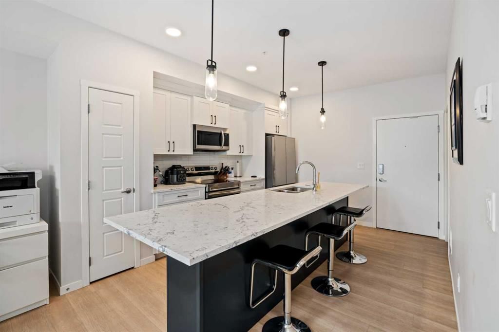 411, 200 Harvest Hills Place NE, Calgary — photo 4 of 24
