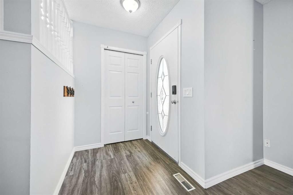 120 Hidden Ranch Hill NW, Calgary — photo 4 of 39