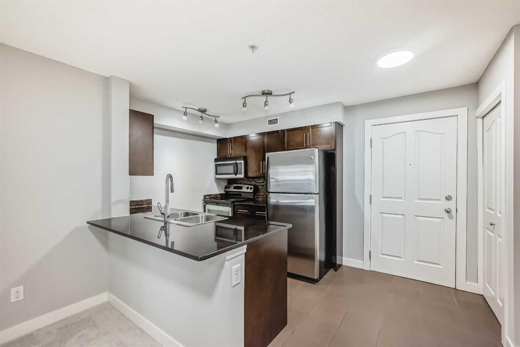 107, 7110 80 Avenue NE, Calgary — main listing photo