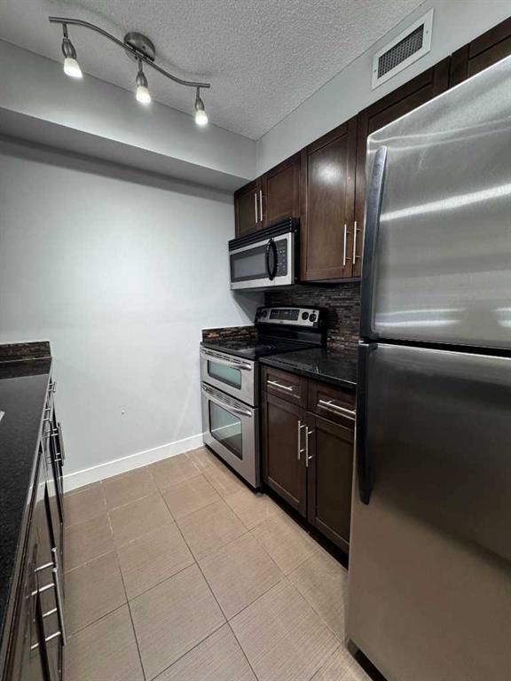 107, 7110 80 Avenue NE, Calgary — photo 4 of 38