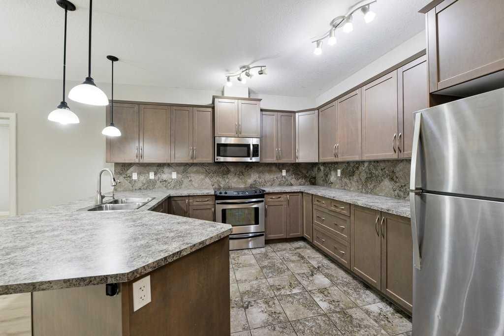 235, 35 ASPENMONT Heights SW, Calgary — photo 5 of 49