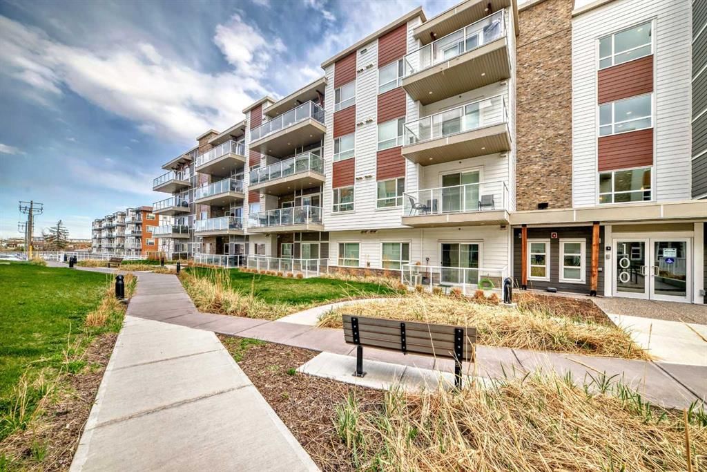 404, 100 Harvest Hills Place NE, Calgary — main listing photo