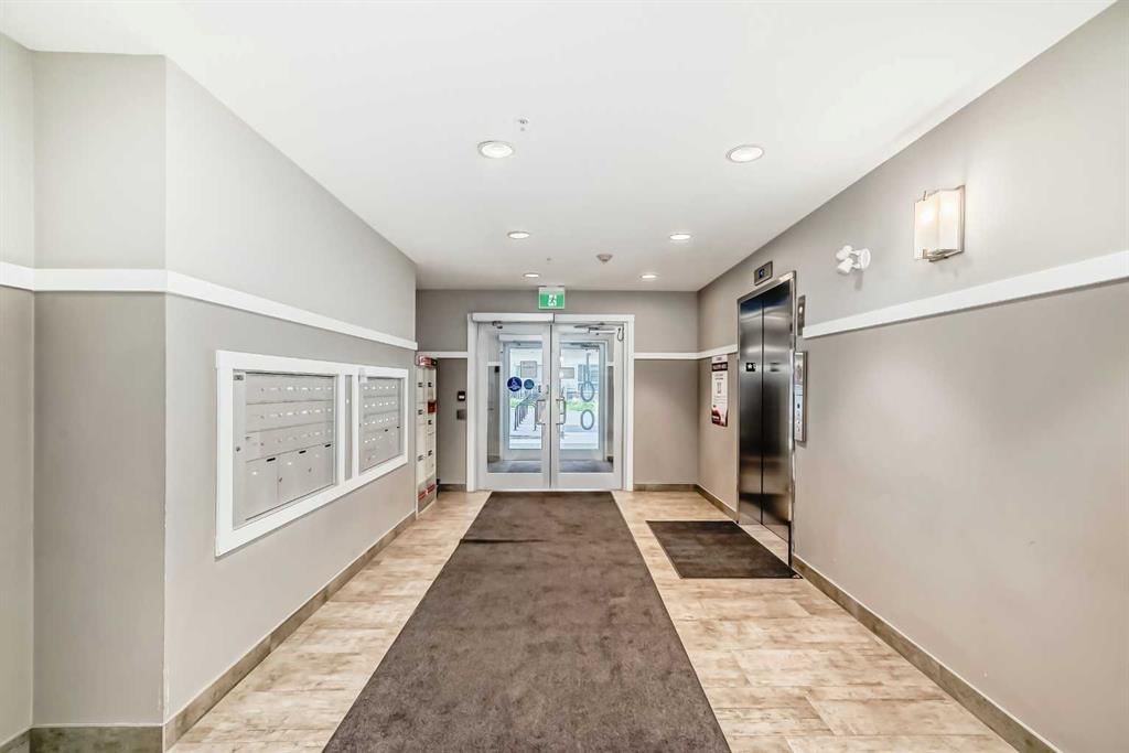 404, 100 Harvest Hills Place NE, Calgary — photo 4 of 35