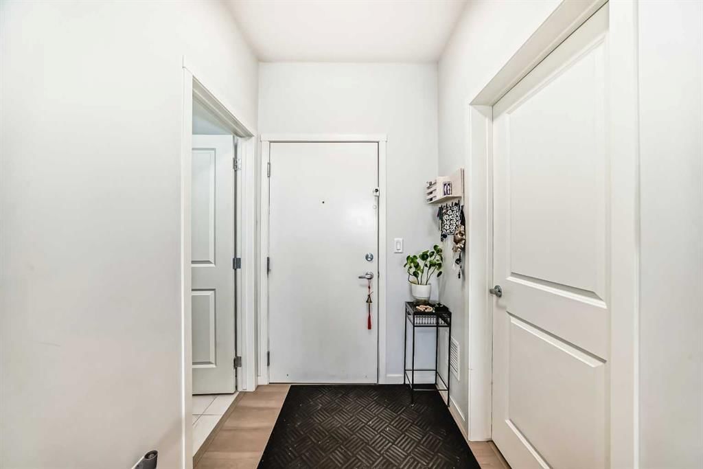404, 100 Harvest Hills Place NE, Calgary — photo 5 of 35