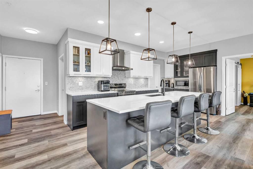 305, 100 Harvest Hills Place NE, Calgary — main listing photo