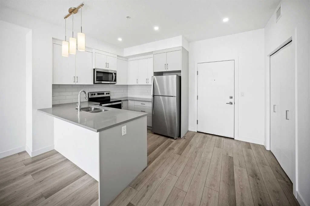 403, 205 Spring Creek Common SW, Calgary — photo 4 of 35