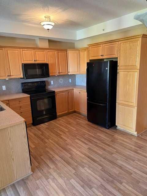 203, 15 Everstone Drive SW, Calgary — photo 5 of 32
