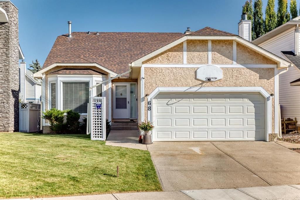 68 Woodmark Crescent SW, Calgary — main listing photo