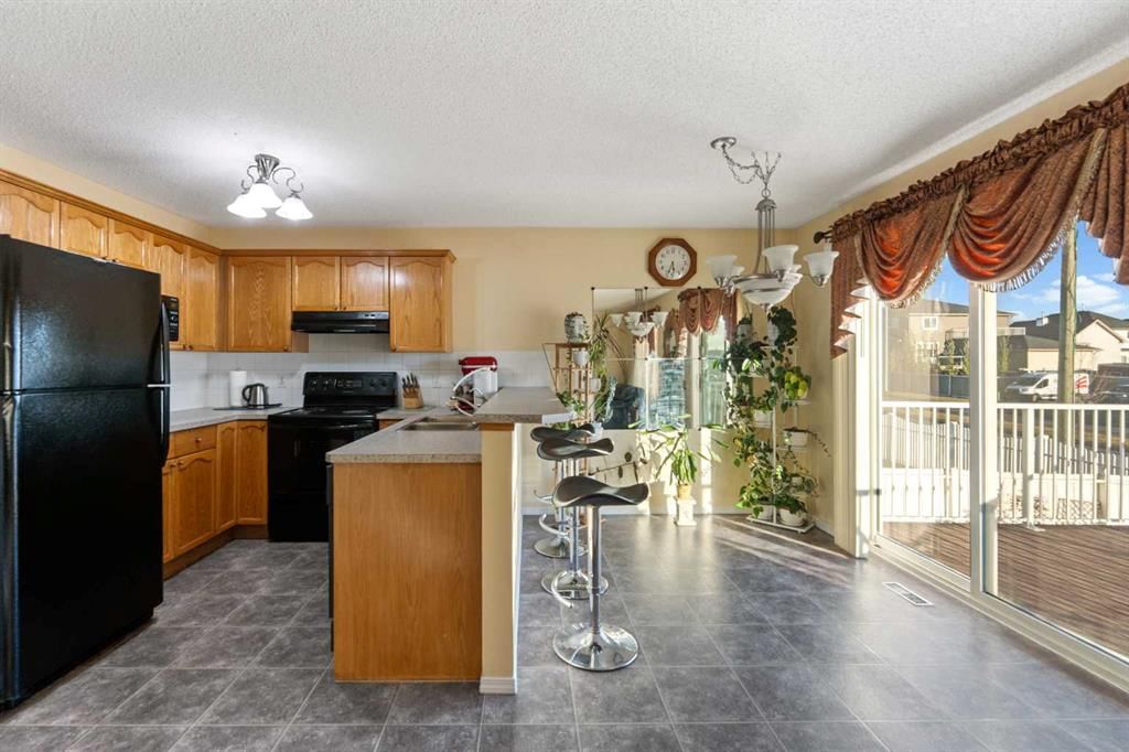 27 Saddlemont Manor NE, Calgary — photo 4 of 32