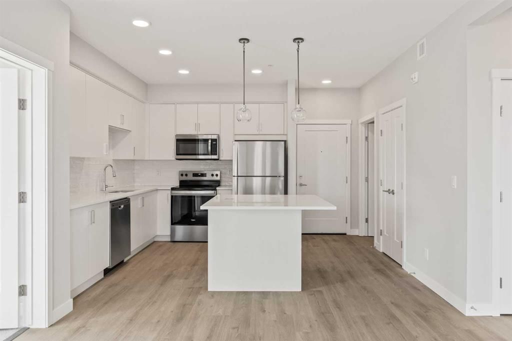 203, 700 Shawnee Square SW, Calgary — main listing photo