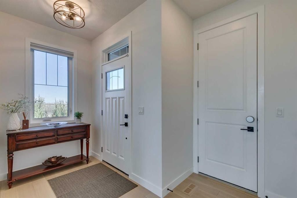 794 Bluerock Way SW, Calgary — photo 4 of 50