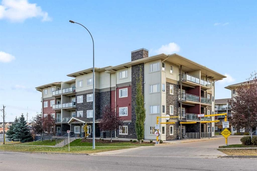 310, 11 Millrise Drive SW, Calgary — main listing photo