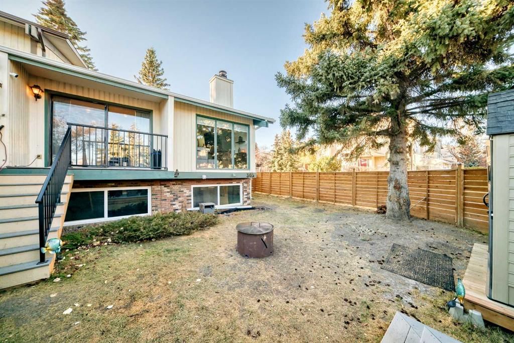 303 Coach Side Road SW, Calgary — main listing photo
