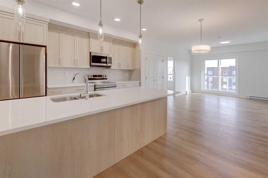 1407, 550 Belmont Street SW, Calgary — photo 3 of 36