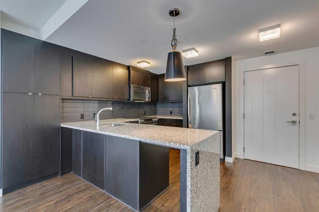 107, 25 Aspenmont Heights SW, Calgary — main listing photo