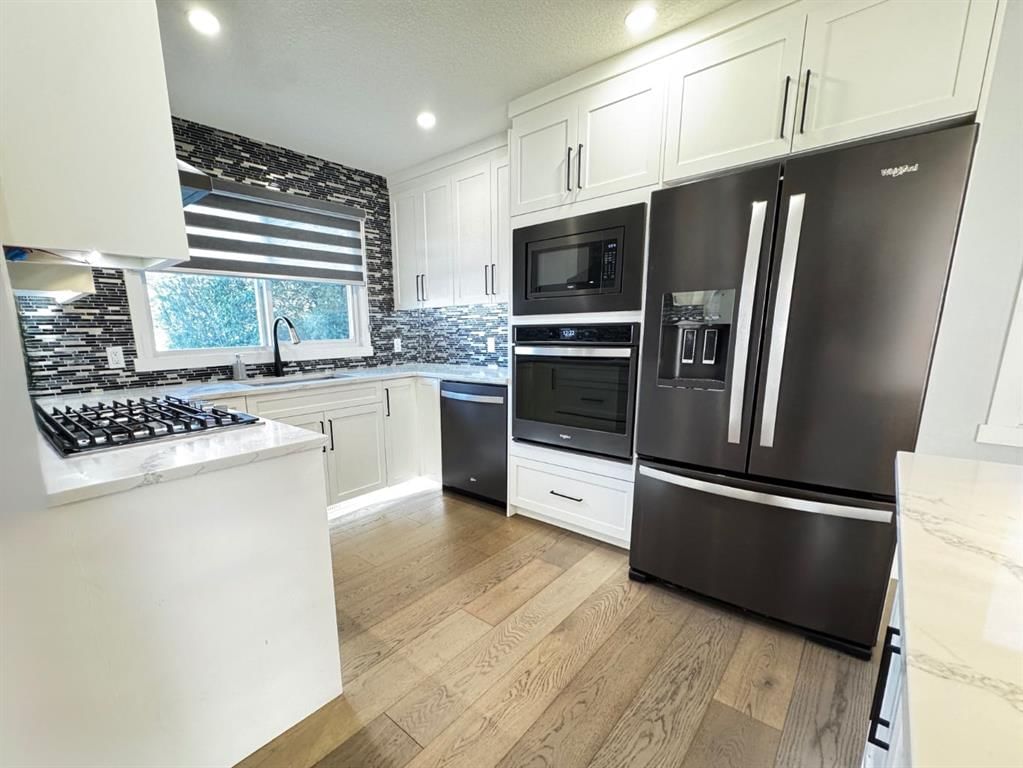10304 Elbow Drive SW, Calgary — photo 2 of 24