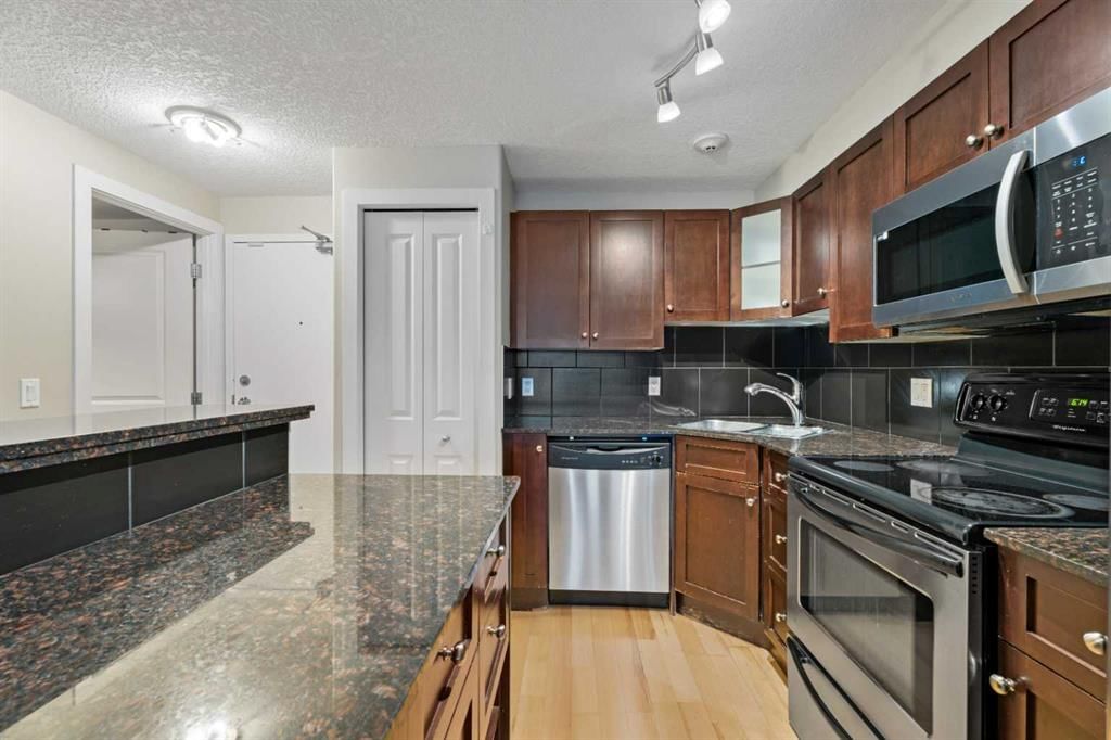404, 728 3 Avenue NW, Calgary — photo 5 of 21