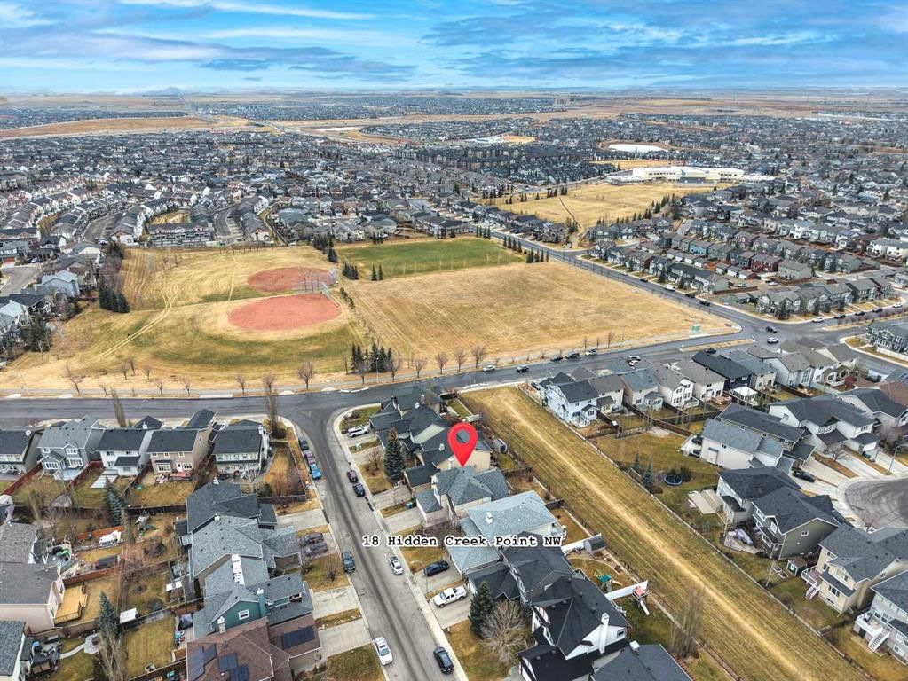 18 HIDDEN CREEK Point NW, Calgary — photo 2 of 35