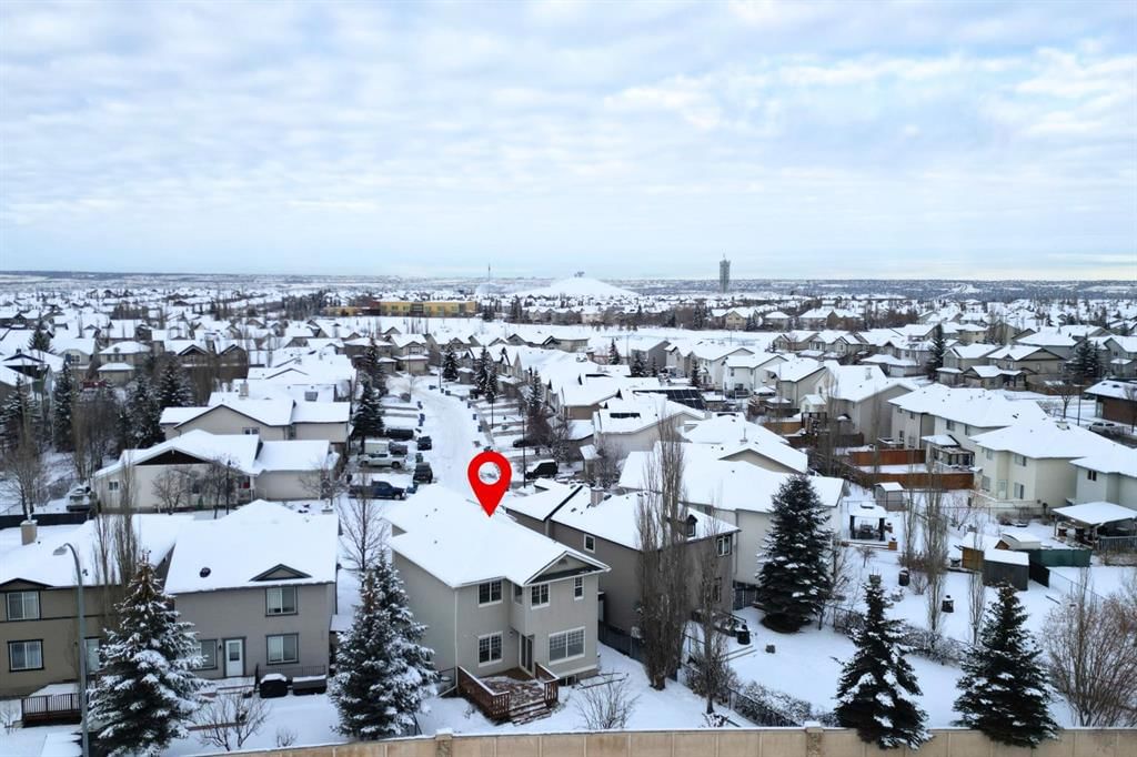 64 Cougarstone Square SW, Calgary — photo 4 of 48