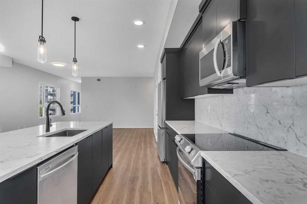 201, 360 Harvest Hills Way NE, Calgary — photo 3 of 26
