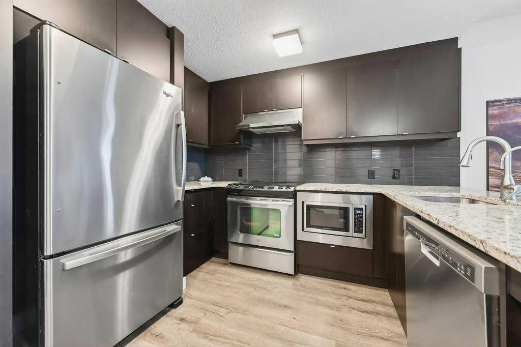 201, 25 Aspenmont Heights SW, Calgary — photo 4 of 24