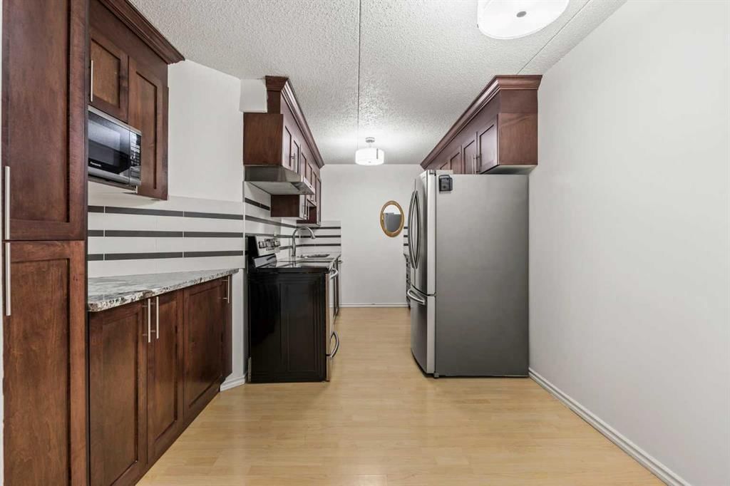 514, 5204 Dalton Drive NW, Calgary — photo 4 of 33