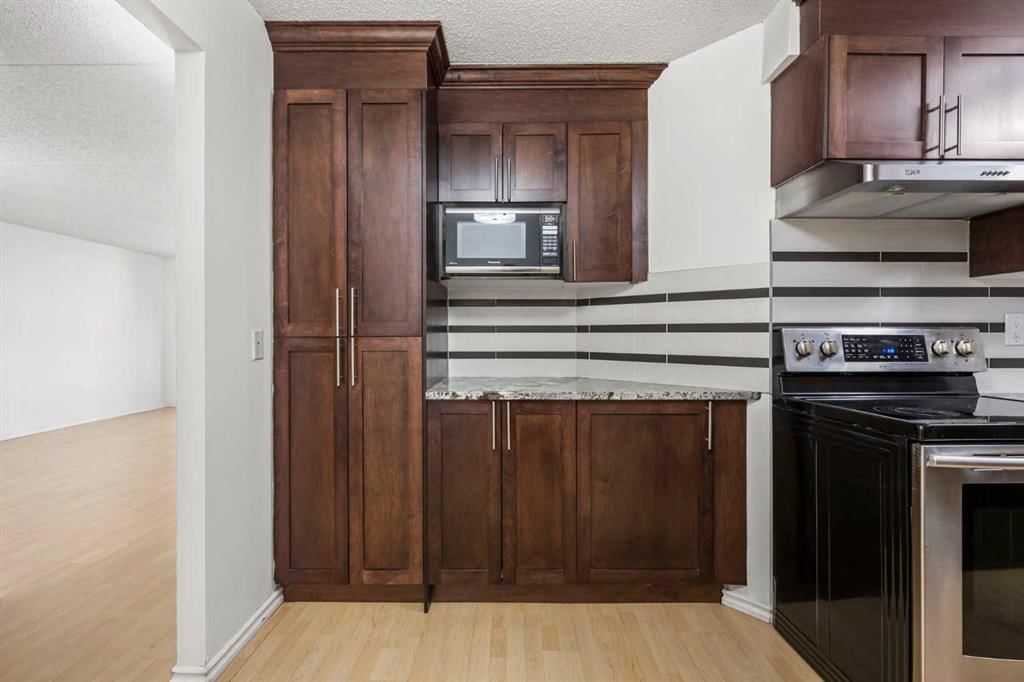 514, 5204 Dalton Drive NW, Calgary — photo 5 of 33