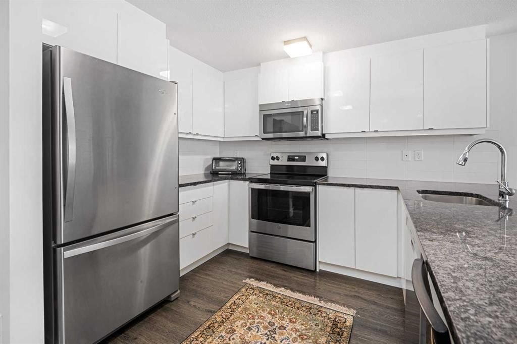 305, 45 Aspenmont Heights SW, Calgary — photo 3 of 28