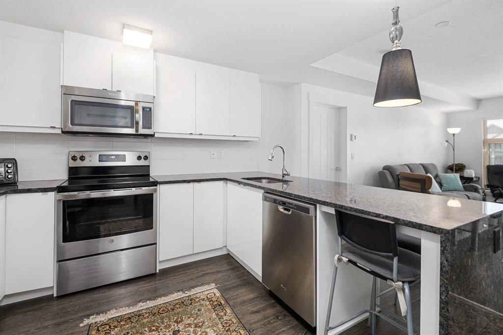 305, 45 Aspenmont Heights SW, Calgary — photo 4 of 28