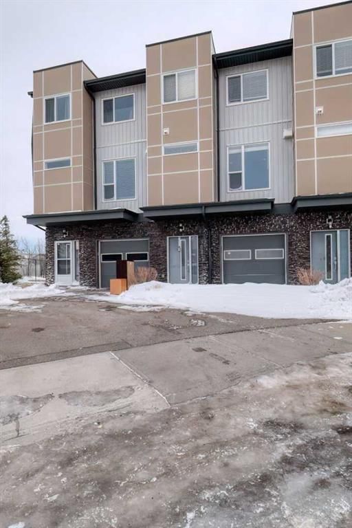 302, 70 Saddlestone Drive NE, Calgary — photo 3 of 32