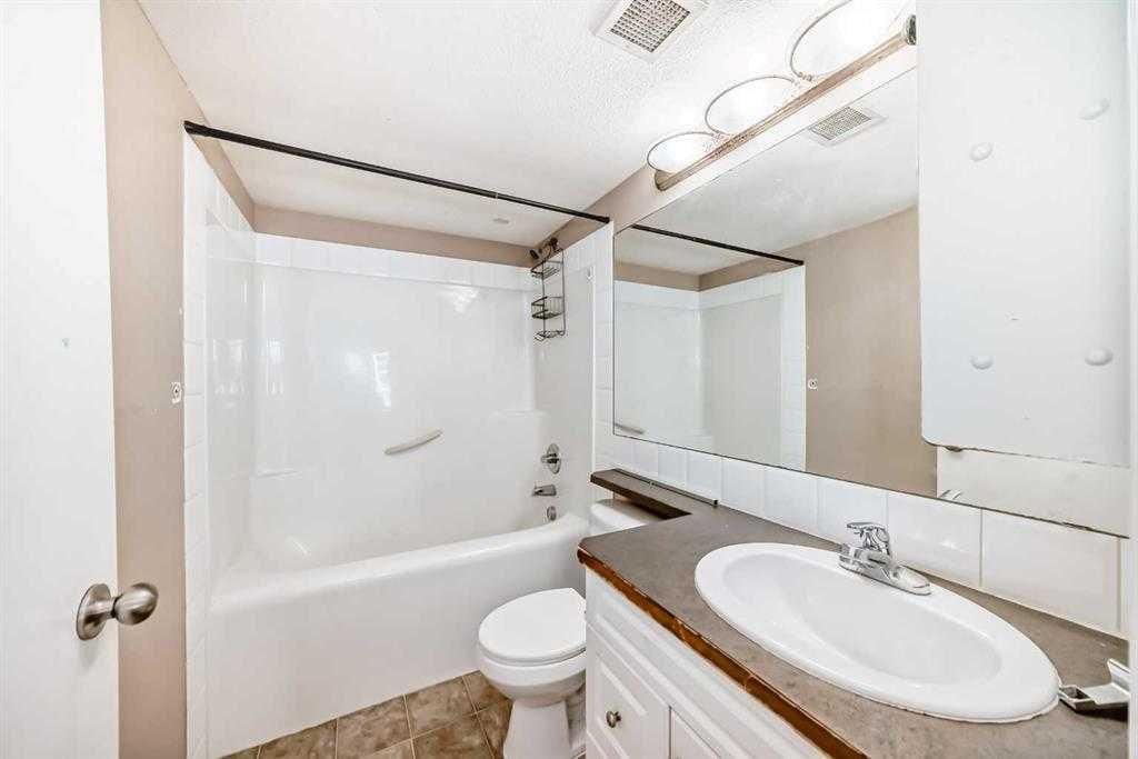 411, 2000 Applevillage Court SE, Calgary — main listing photo