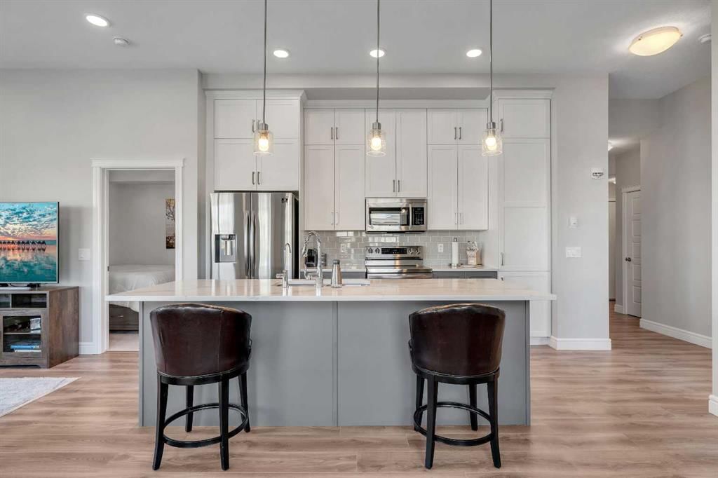 418, 19661 40 Street SE, Calgary — main listing photo