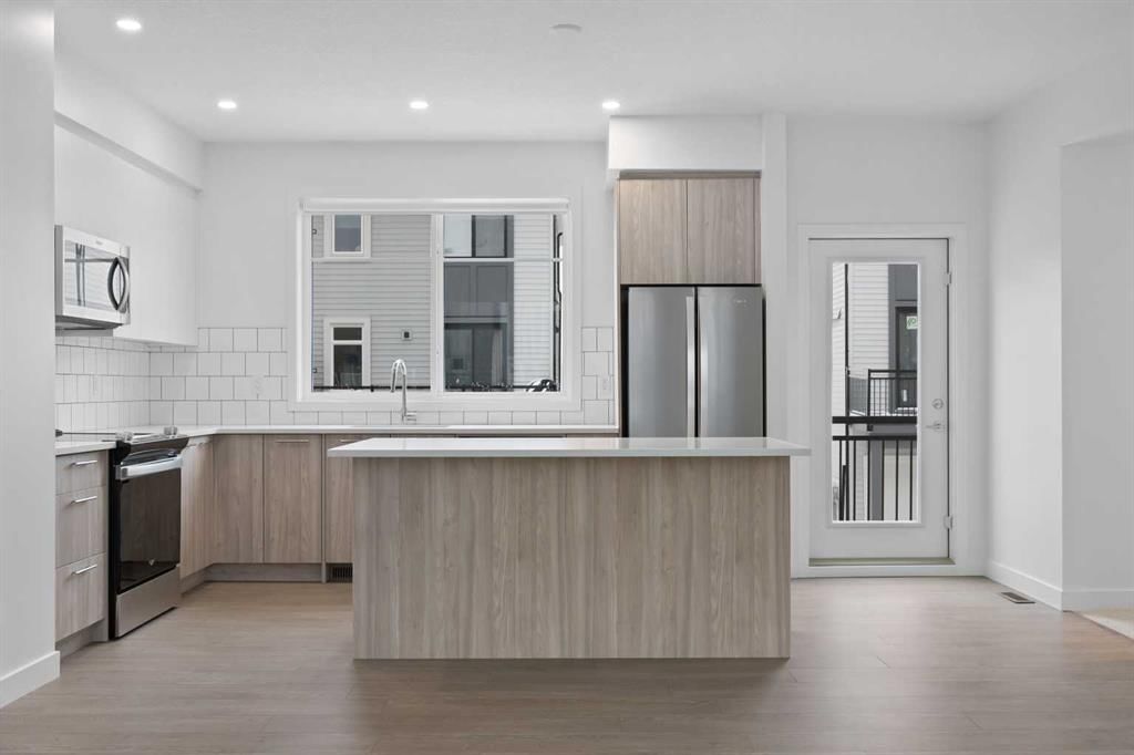 #210, 857 Belmont Drive SW, Calgary — photo 4 of 22