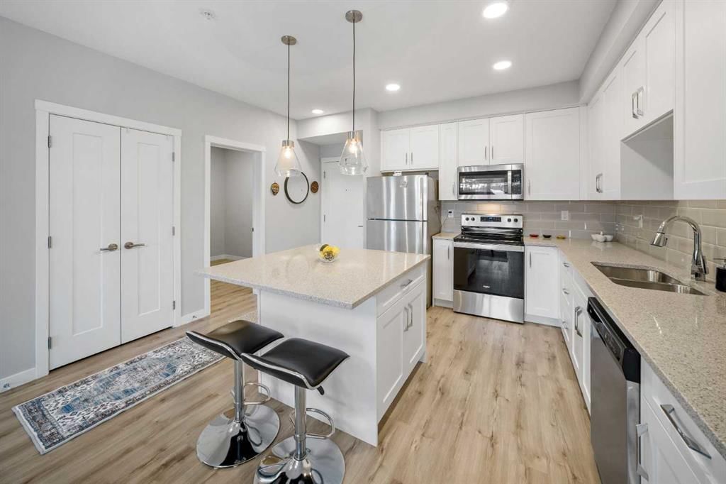 205, 150 Shawnee Square SW, Calgary — photo 5 of 23
