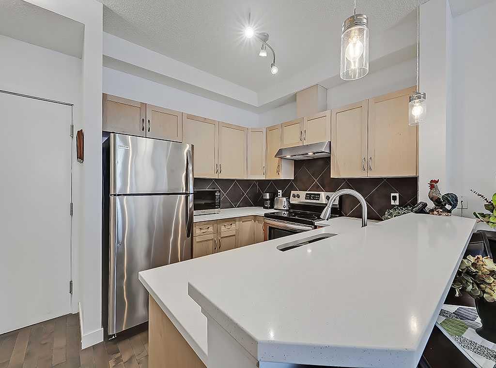302, 540 5 Avenue NE, Calgary — photo 5 of 33