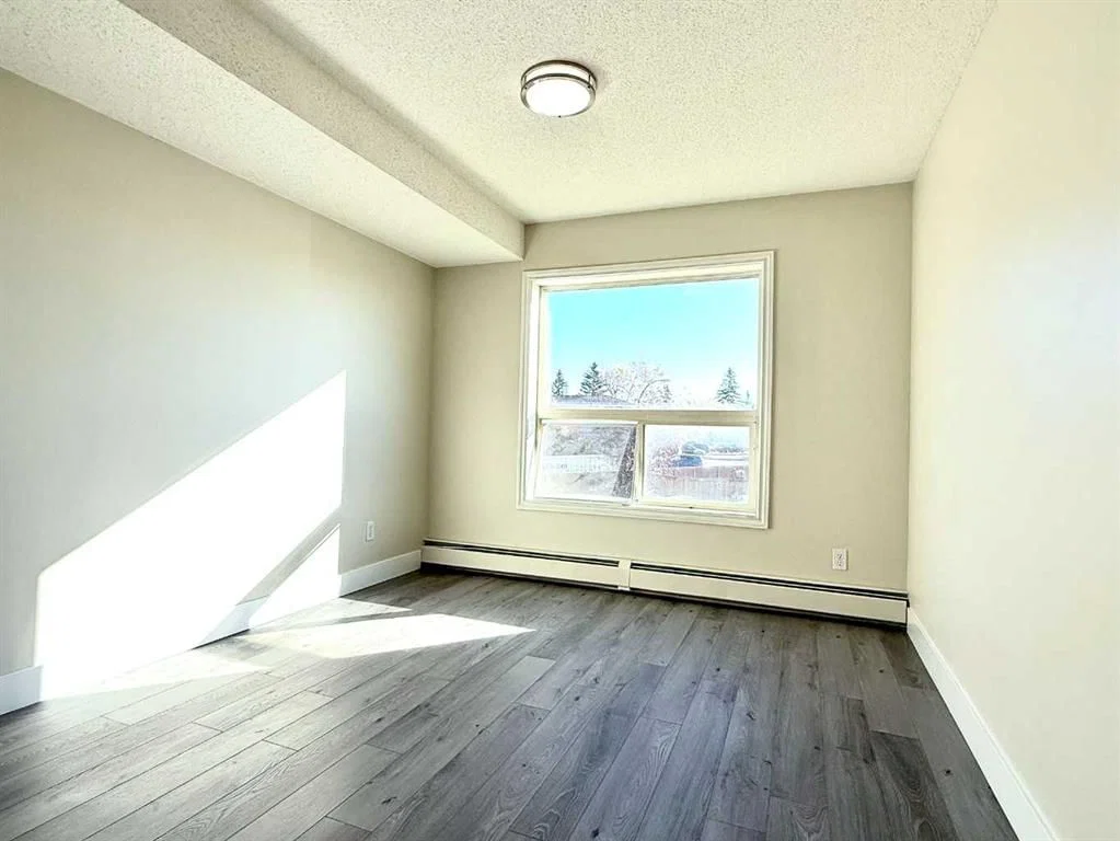 207, 5555 Falsbridge Drive NE, Calgary — photo 5 of 13