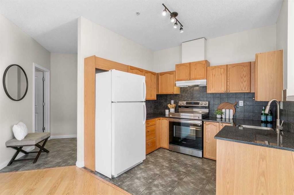 121, 8 Prestwick Pond Terrace SE, Calgary — photo 4 of 47