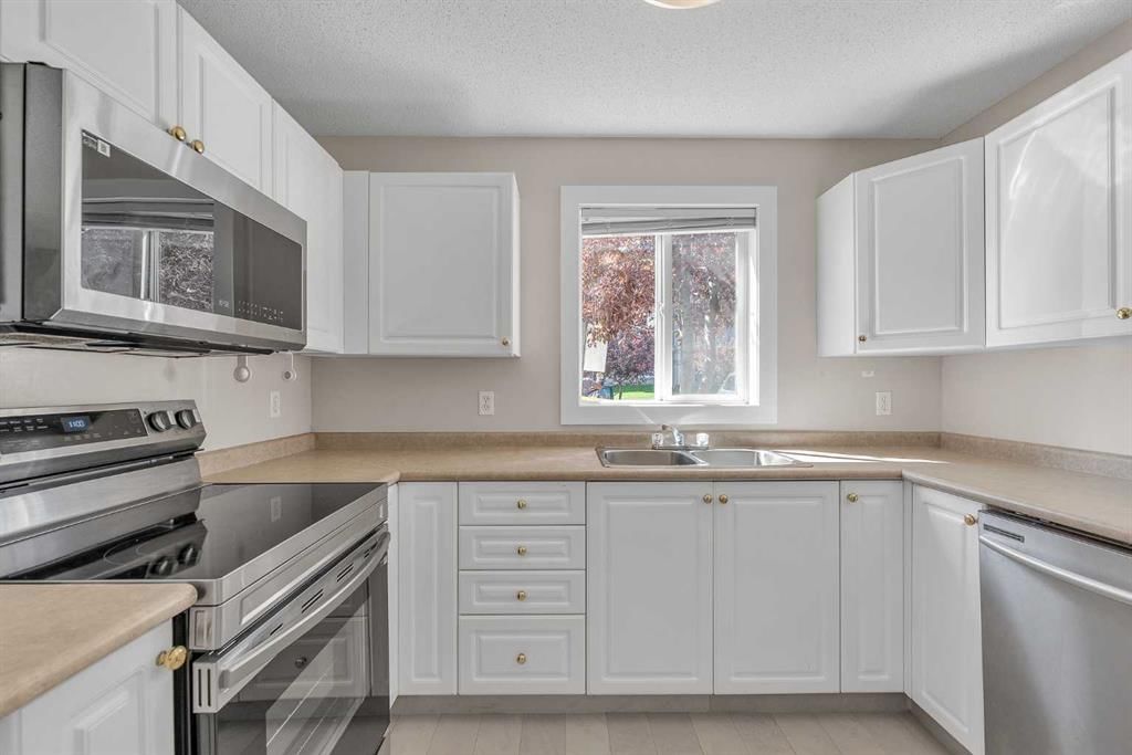 102, 2000 Somervale Court SW, Calgary — main listing photo
