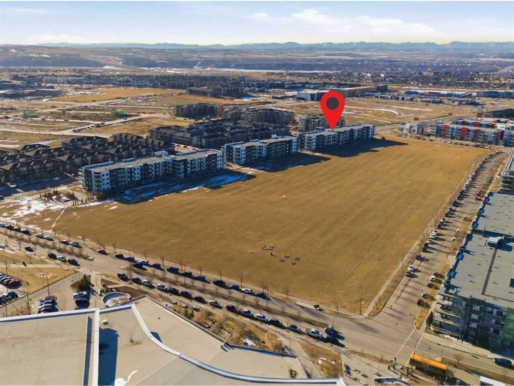 211, 4150 Seton Drive SE, Calgary — main listing photo