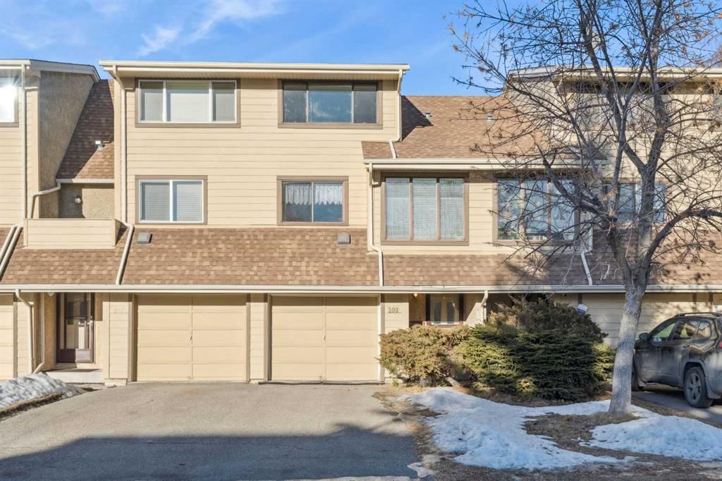 308 Woodvale Crescent SW, Calgary — main listing photo