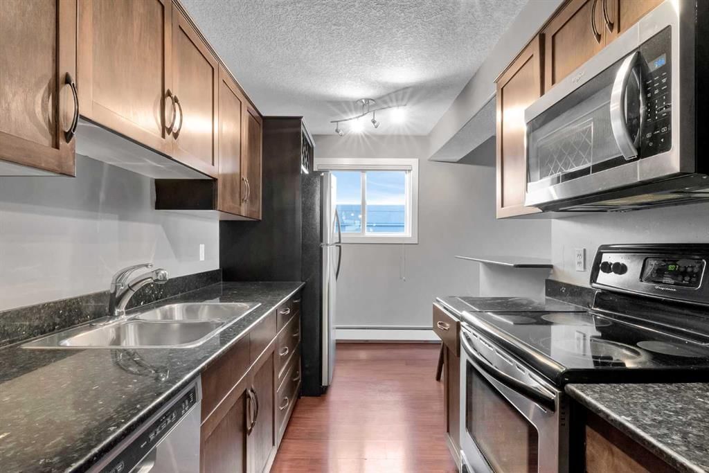 302, 931 2 Avenue NW, Calgary — photo 3 of 22