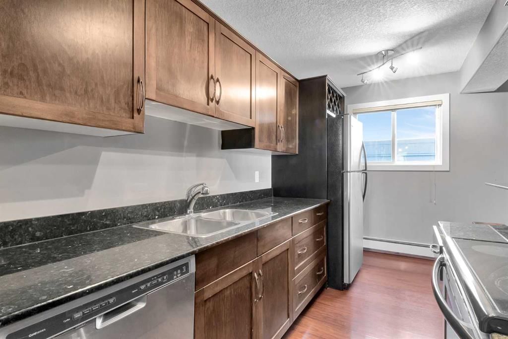 302, 931 2 Avenue NW, Calgary — photo 4 of 22