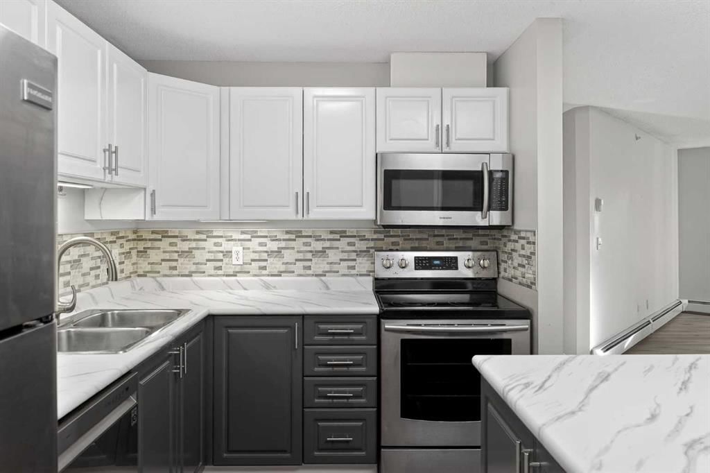 408, 1000 Somervale Court SW, Calgary — photo 3 of 40